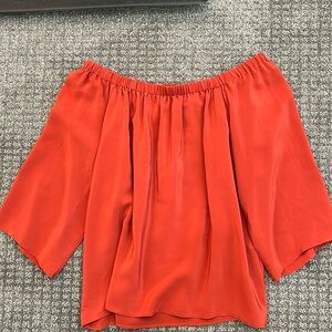 Off the shoulder orange silk top
